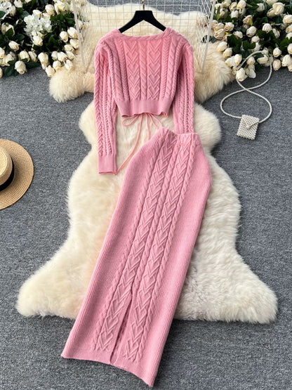 New autumn and winter design sense hollow strap short belly-exposed knitted top + ultra-high waist cable sweater skirt