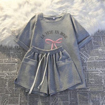 Short-sleeved shorts casual two-piece suit for women summer new thin fashionable age-reducing small man running sportswear loose