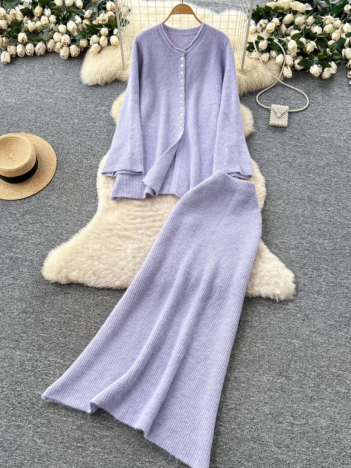Lazy style casual wear for women in autumn and winter, loose round neck casual long-sleeved single-breasted knitted top with high waist skirt