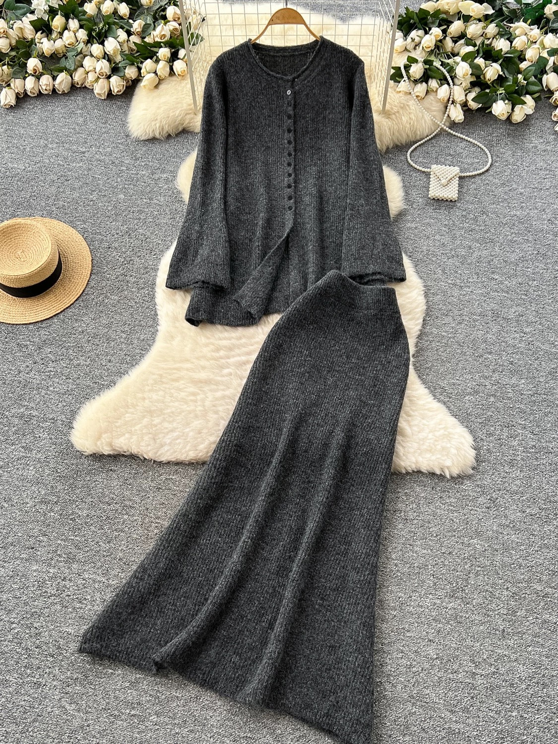 Lazy style casual wear for women in autumn and winter, loose round neck casual long-sleeved single-breasted knitted top with high waist skirt