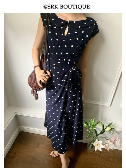 SRK French-style elegant dress featuring a waist-cinching, slimming silhouette and stylish contrasting polka-dot design.