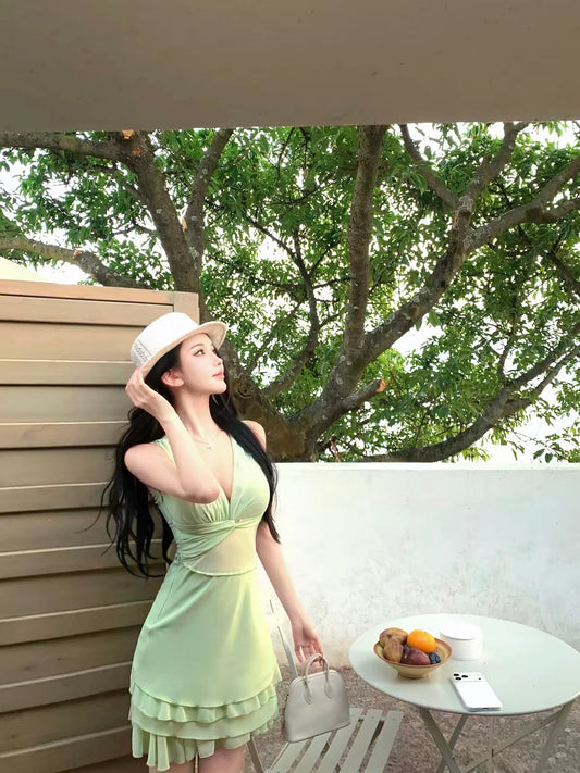 JAYKY YANG [As Worn by Pu Yanyan] V-Neck Twist-Front Sleeveless Dress with Ruffled Waist Detail