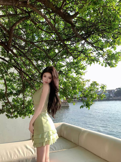 JAYKY YANG [As Worn by Pu Yanyan] V-Neck Twist-Front Sleeveless Dress with Ruffled Waist Detail