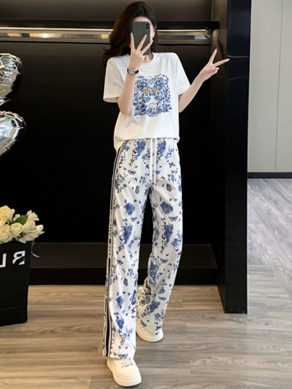 New summer style niche non-collision casual sports suit women's loose white short-sleeved T-shirt wide-leg pants two-piece suit