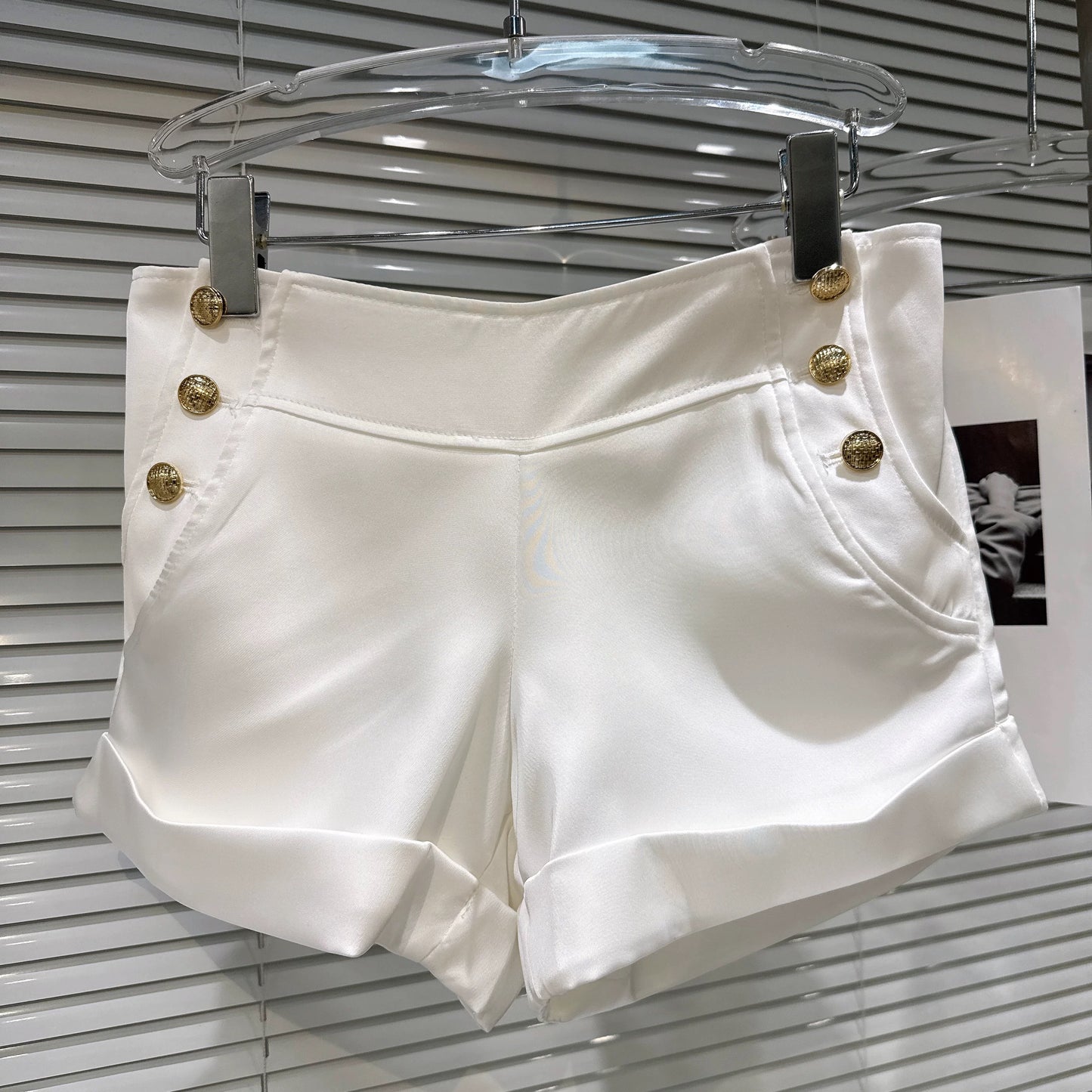 Popular online style, 2026 Spring New Arrival: Sweet and alluring chiffon blouse with ruffled trim and metal button shorts set.