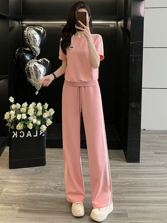 High-end pink casual sports suit for women 2025 summer trendy age-reducing slimming short-sleeved T-shirt wide-leg pants two-piece suit
