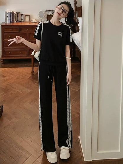 High-end pink casual sports suit for women 2025 summer trendy age-reducing slimming short-sleeved T-shirt wide-leg pants two-piece suit