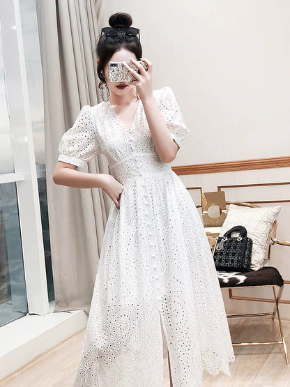 Long skirt women's summer 2024 new princess skirt holiday hollow embroidered beach skirt seaside white dress
