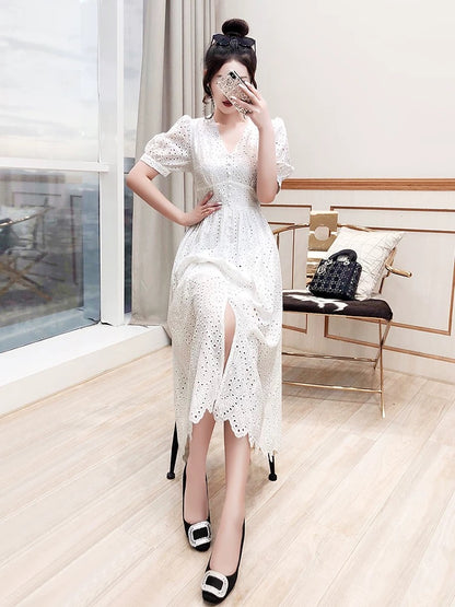 Long skirt women's summer 2024 new princess skirt holiday hollow embroidered beach skirt seaside white dress