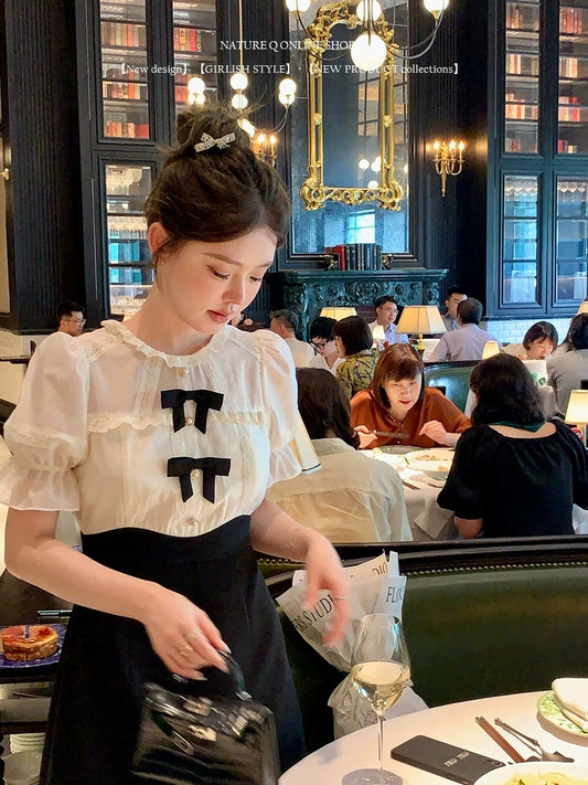 Yang Xiaojuan French style daughter-in-law black and white splicing dress high waist slim princess dress short skirt\detachable bow