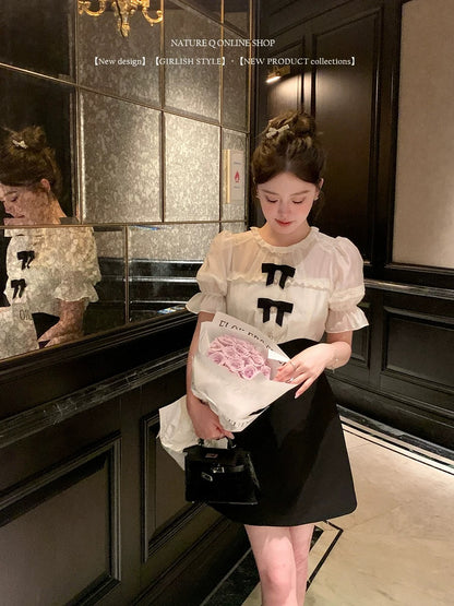 Yang Xiaojuan French style daughter-in-law black and white splicing dress high waist slim princess dress short skirt\detachable bow