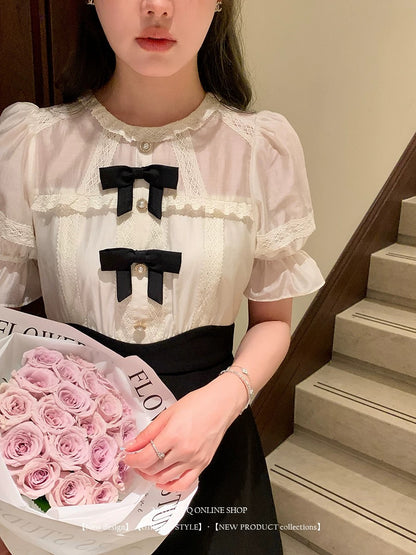 Yang Xiaojuan French style daughter-in-law black and white splicing dress high waist slim princess dress short skirt\detachable bow