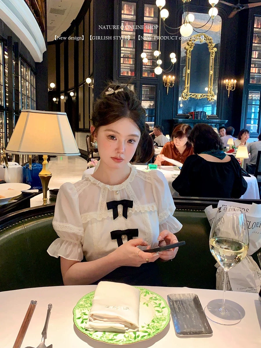 Yang Xiaojuan French style daughter-in-law black and white splicing dress high waist slim princess dress short skirt\detachable bow