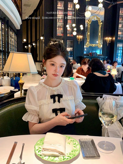 Yang Xiaojuan French style daughter-in-law black and white splicing dress high waist slim princess dress short skirt\detachable bow