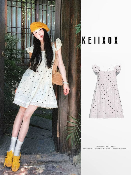 Super beautiful polka dot strappy short dress for women summer 2025 new loose slim French style short skirt with small flying sleeves