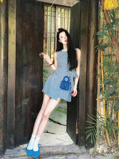 Small sleeveless plaid vest dress for women in summer with slim waist and French temperament lace-up A-line short skirt