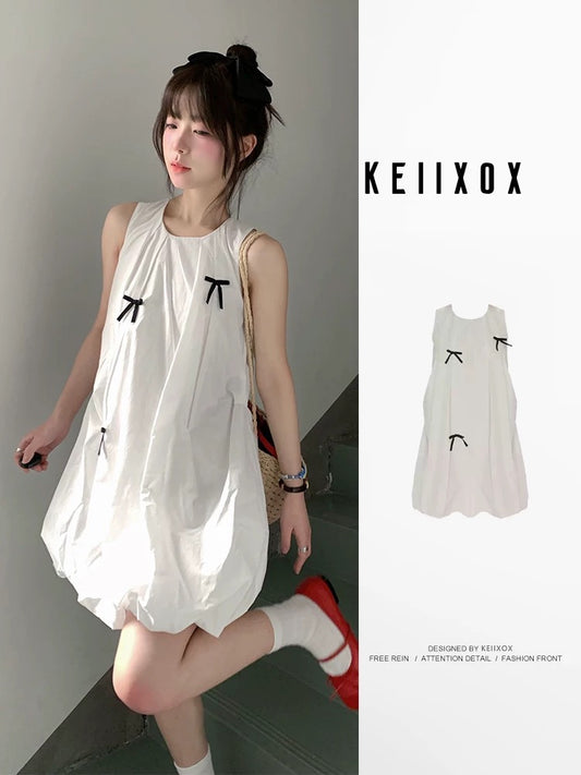 Small white flower bud sleeveless vest dress for women in summer French style sweet bow loose slimming puffy skirt