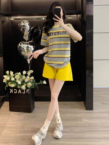 Chic and stylish striped short-sleeve two-piece set for women (Summer 2026)—casual, sporty, and trendy. Features a loose fit that is slimming and offers a youthful look.