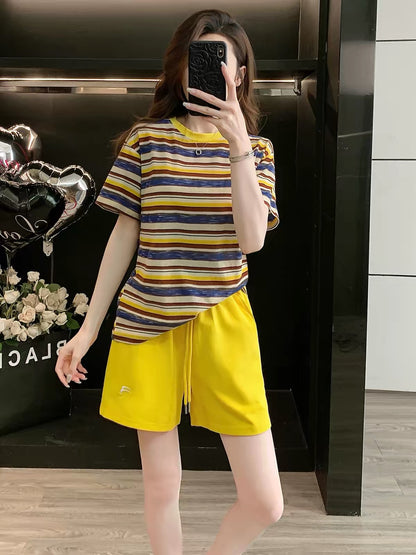 Stylish and trendy striped short-sleeve two-piece set for women (Summer 2026)—casual, sporty, and slimming; features a loose, youthful fit.