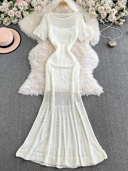 French retro-style openwork knit dress, new summer style, elegant, waist-cinching, slimming, mid-length A-line fishtail skirt.