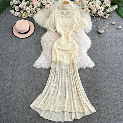 French retro-style openwork knit dress, new summer style, elegant, waist-cinching, slimming, mid-length A-line fishtail skirt.