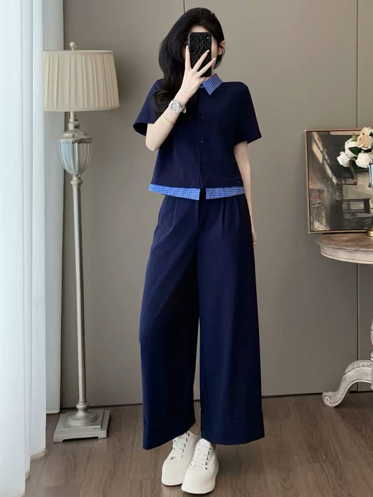Korean-style trendy sporty two-piece set for women (Summer 2026): chic, slimming, collared short-sleeve top and wide-leg trousers—casual and stylish.