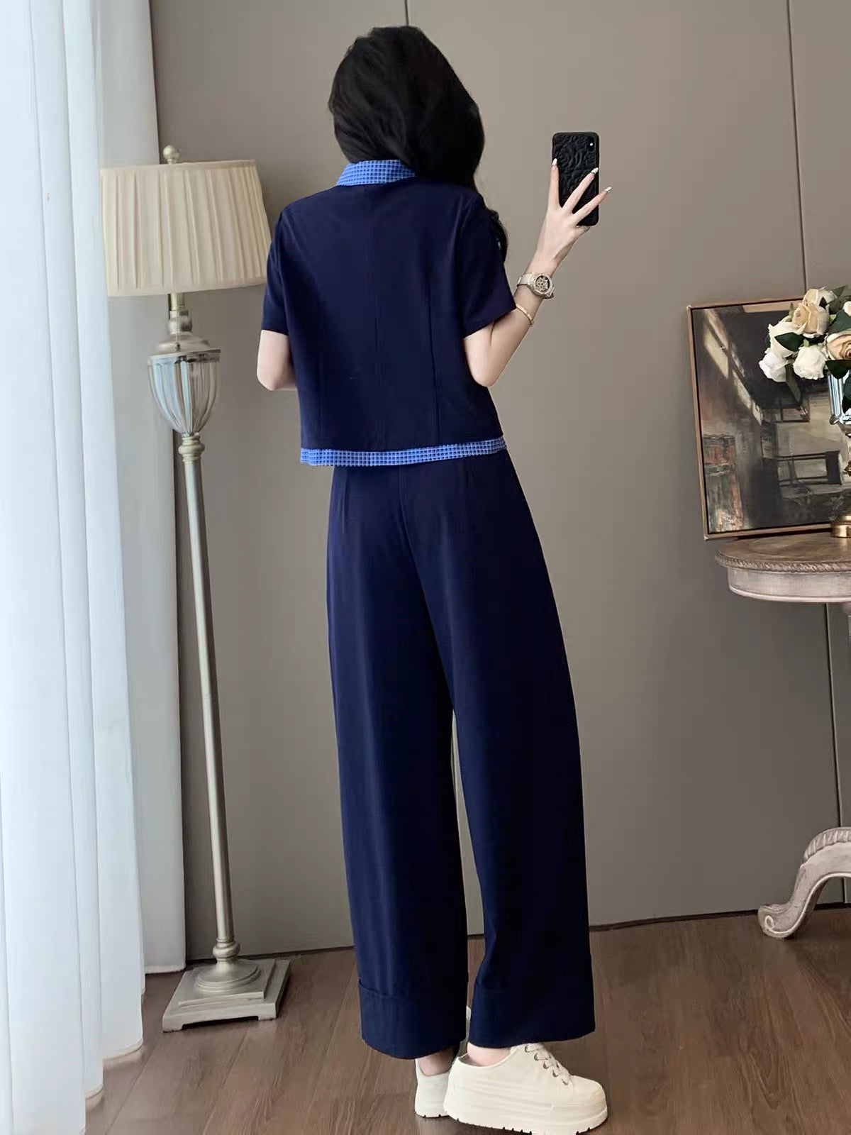 Korean-style trendy sporty two-piece set for women (Summer 2026): chic, slimming, collared short-sleeve top and wide-leg trousers—casual and stylish.