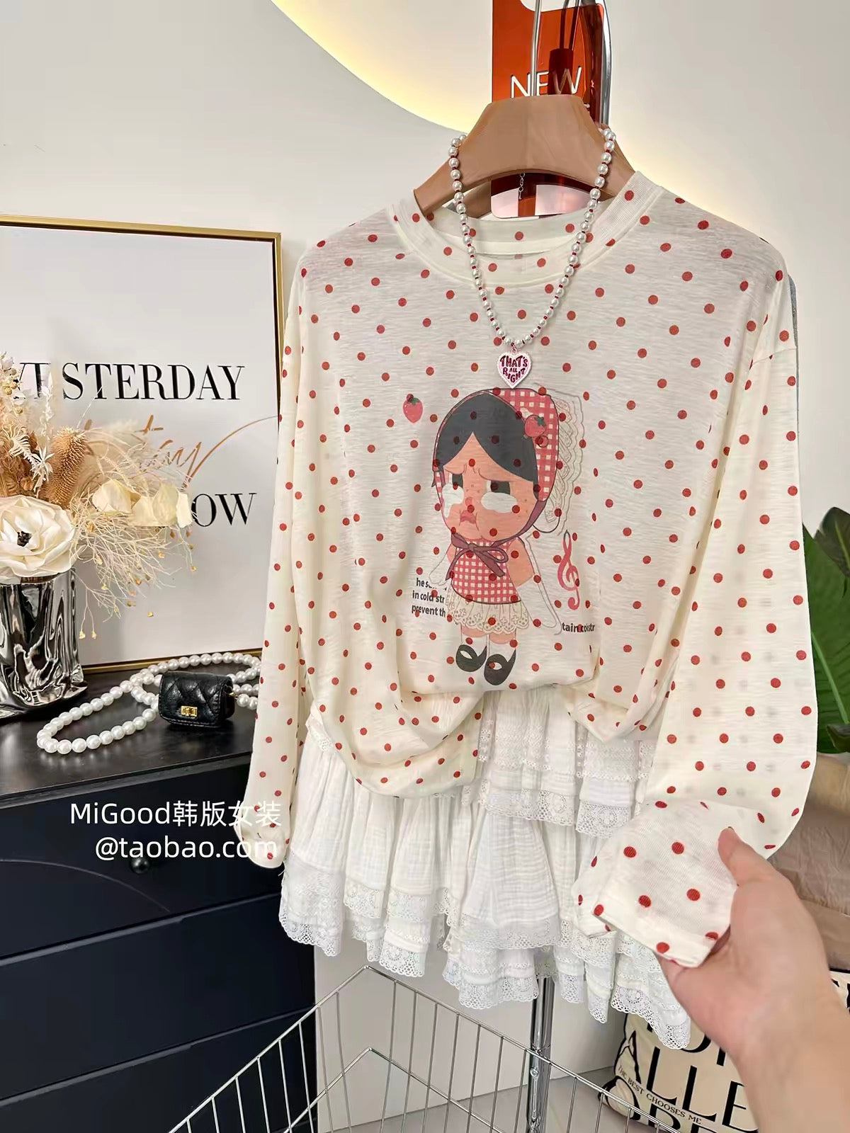 Sweet and adorable sun-protection top—a stylish, trendy, loose-fitting women's summer T-shirt featuring Korean-style polka dots and a cute cartoon print, crafted from lightweight Lyocell fabric.