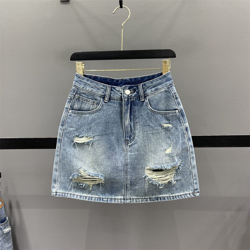 European ripped denim skirt female 2023 summer foreign style high waist slimming A-line anti-light package hip short skirt