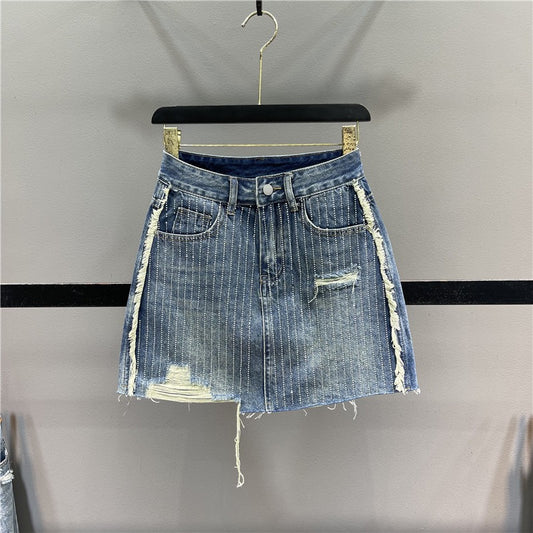 Heavy industry hot diamond denim skirt women's summer new design sense of raw edge hole high waist bag hip skirt A word skirt