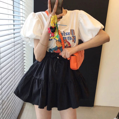 Korean chic summer playful age-reducing round neck cartoon letter lantern sleeve T-shirt + high waist drawstring fluffy skirt