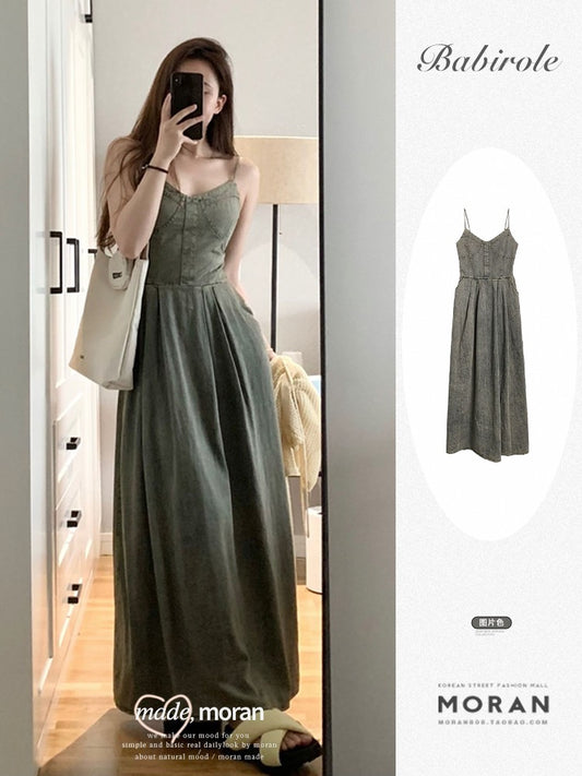 Hot girls pull sister suspender skirt female summer Hong Kong flavor retro wash water denim dress pear shape wearing a long skirt to look thin