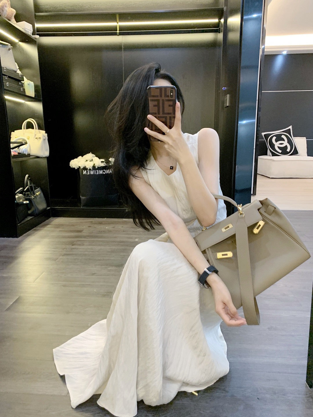 Leathercat suspender dress summer new women's 2023 high-end sense of self-cultivation bag hip slim temperament long skirt