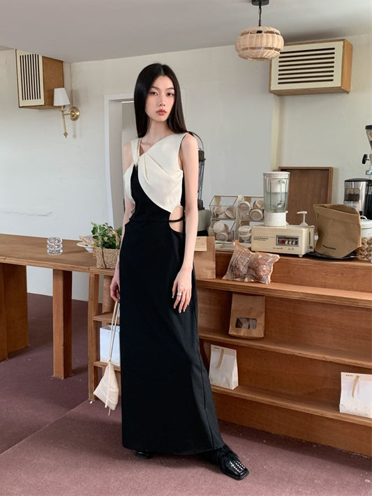 2023 summer new high-end temperament niche hollow waist long skirt twisted and contrasting color slimming dress women