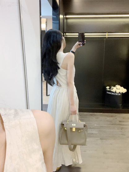 Leathercat suspender dress summer new women's 2023 high-end sense of self-cultivation bag hip slim temperament long skirt