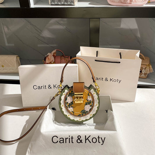 Carit Koty high-end niche round cake handbag bag 2023 new retro embroidery small round bag female Messenger