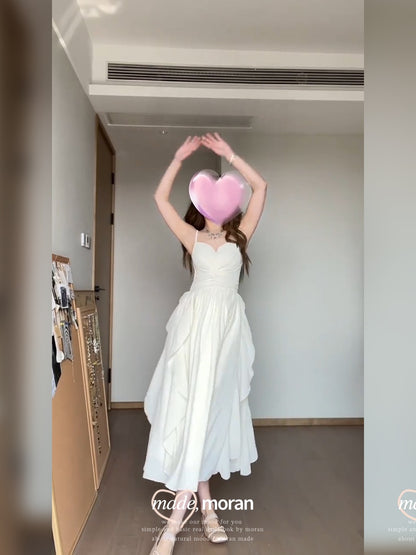 Seaside vacation style super fairy sling small white dress French gentle dress pure desire style temperament slightly fat and thin summer