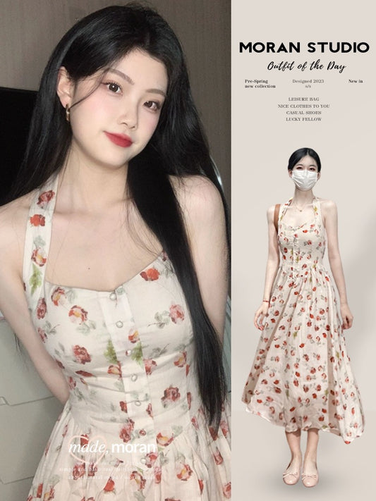 Sweet and spicy pure desire hanging neck floral dress women's summer French tea break holiday wind suspender long skirt showing thin temperament