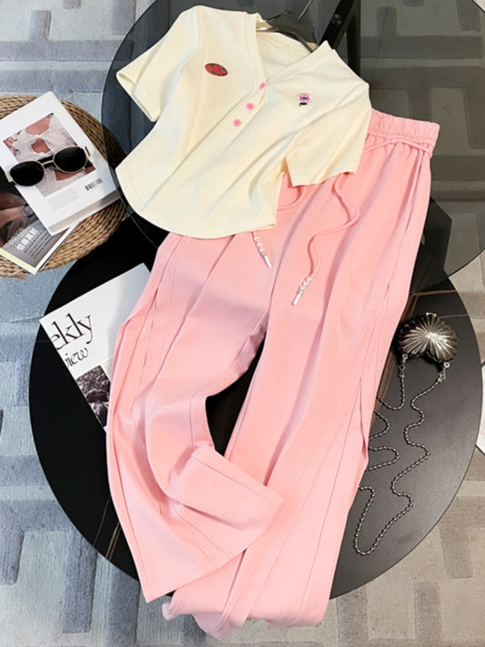 Fashion age-reducing casual sports suit women's summer 2023 new style foreign style short-sleeved pink wide-leg pants two-piece set