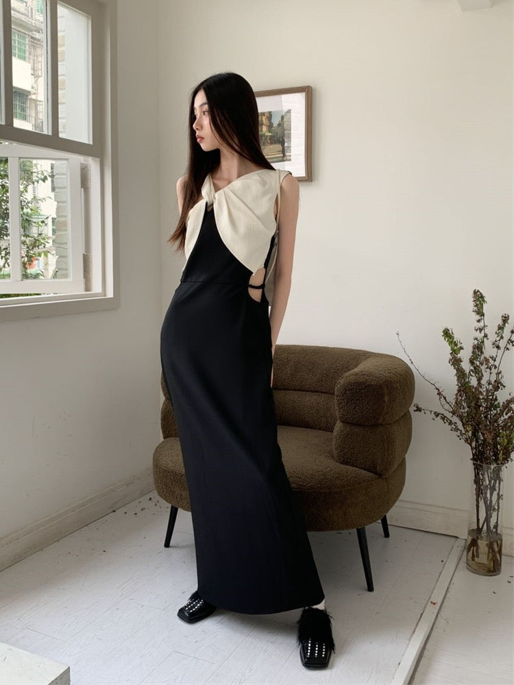 2023 summer new high-end temperament niche hollow waist long skirt twisted and contrasting color slimming dress women