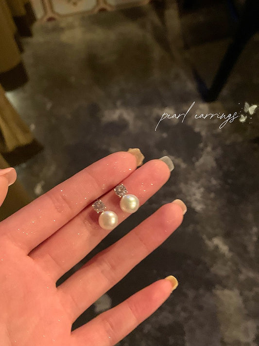 Exquisite pearl flash zirconium earrings light luxury niche earrings design high-end earrings female no ear holes mosquito coil ear clips
