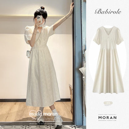 Gentle wind jacquard V-neck French dress women 2023 summer new waist short-sleeved sweet first love princess skirt