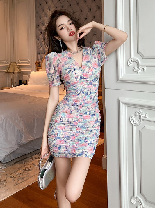 Yujie celebrity style light luxury broken flower bag hip dress elegant temperament small tall V-neck tea break skirt new style