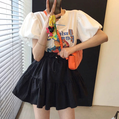 Korean chic summer playful age-reducing round neck cartoon letter lantern sleeve T-shirt + high waist drawstring fluffy skirt