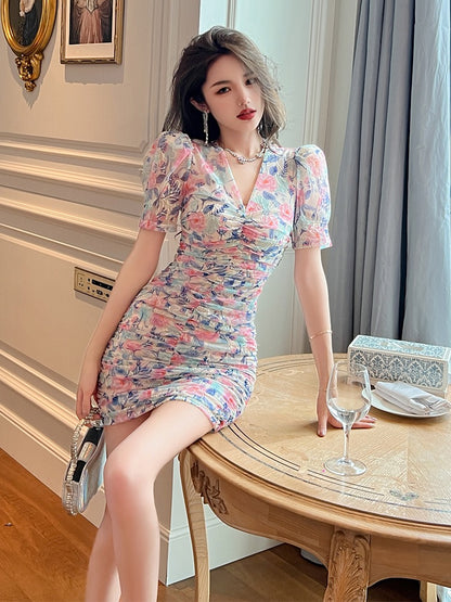 Yujie celebrity style light luxury broken flower bag hip dress elegant temperament small tall V-neck tea break skirt new style