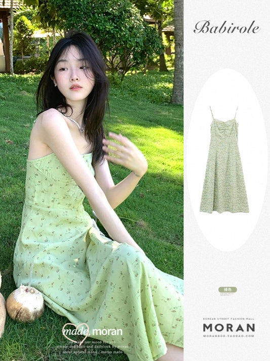 Summer 2023 new green white floral suspender skirt female high-end holiday seaside dress slim and long