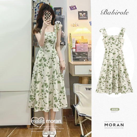 Green floral waist dress women's French tea break small fresh suspender skirt mid-length summer 2023 new style