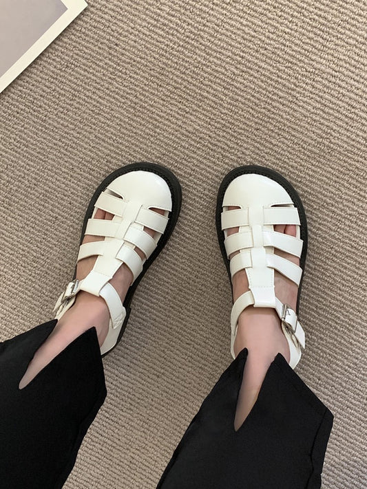 Baotou sandals female fairy style 2023 new summer thick heel all-match casual woven hollow retro Roman shoes