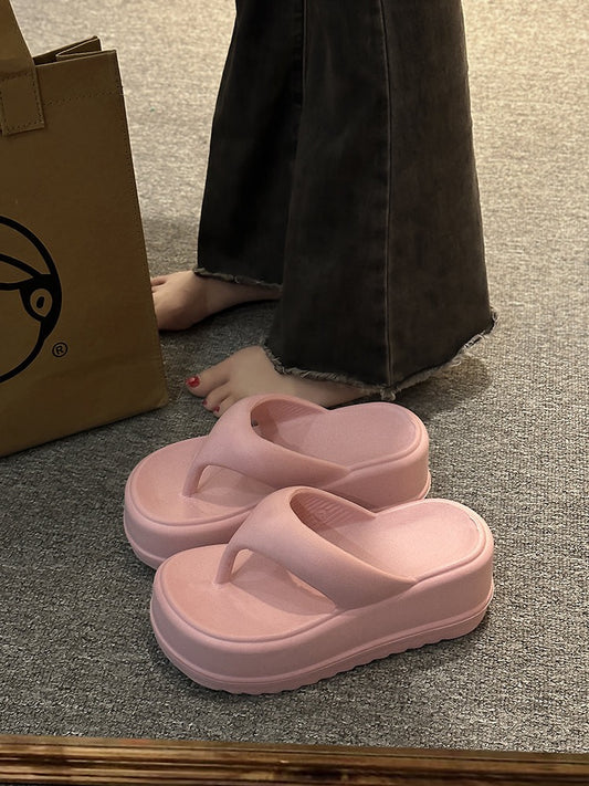 Thick-soled slope heel slippers women's summer wear 2023 new net red seaside beach casual sandals high-end moving flip flops
