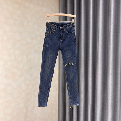 European ripped jeans women's spring 2023 new slimming elastic high waist nine-point pencil pants